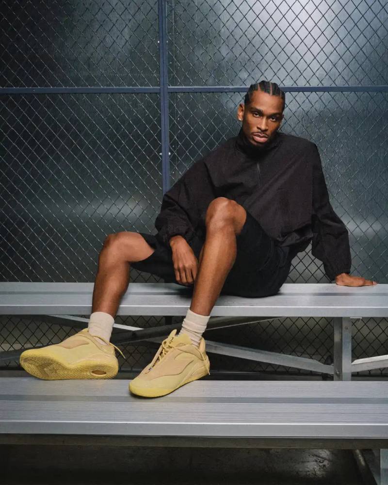 Converse The Converse SHAI 001 basketball shoe in Butter colorway, showing its distinctive puffed upper design and zipper system against a neutral background