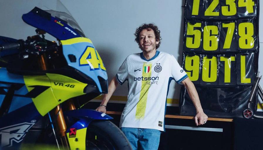 VALENTINO ROSSI INSPIRES INTER'S SPECIAL NIKE AWAY SHIRT photo of special edition Inter Milan away kit created in collaboration with MotoGP champion Valentino Rossi and Nike. The jersey incorporates Rossi's famous Sun and Moon symbols and his racing number 46. The kit will debut during Inter's match against Cagliari on April 12, 2025. The article includes quotes from Rossi expressing his excitement about the collaboration between his two passions: motorcycle racing and football. Information on how to purchase the limited edition shirt is provided at the end.