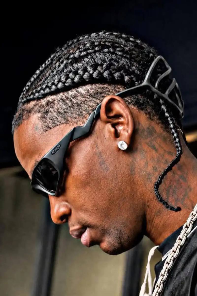 TRAVIS SCOTT WEARS OAKLEY CACTUS JACK EYEWEAR image describing musician Travis Scott wearing unreleased Oakley eyewear at a football match in Hungary.