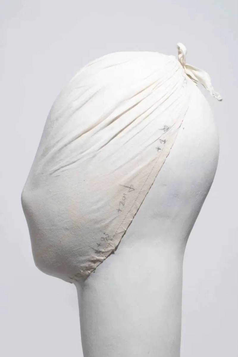 MARTIN MARGIELA ARCHIVE AUCTION RESULTS image detailing the sales figures and specific items from the Martin Margiela fashion archive auction in Paris.