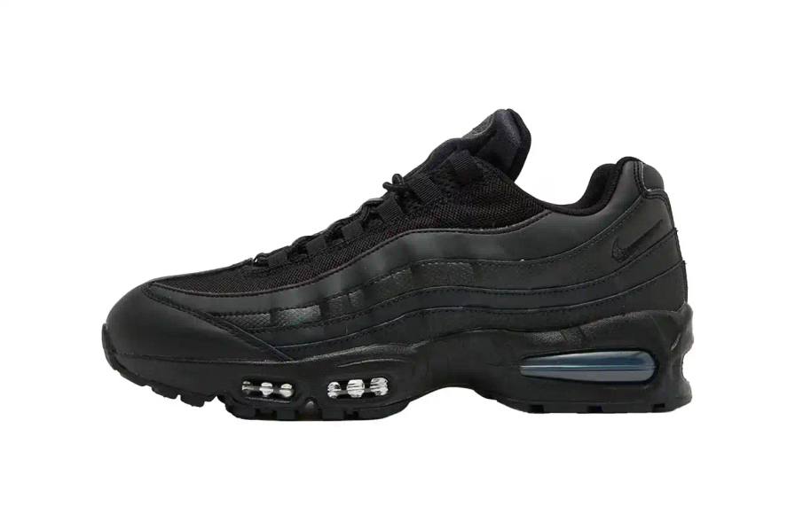 Nike Air Max 95 "Big Bubble" in Triple Black with enlarged air cushioning units visible through blue-tinted windows.