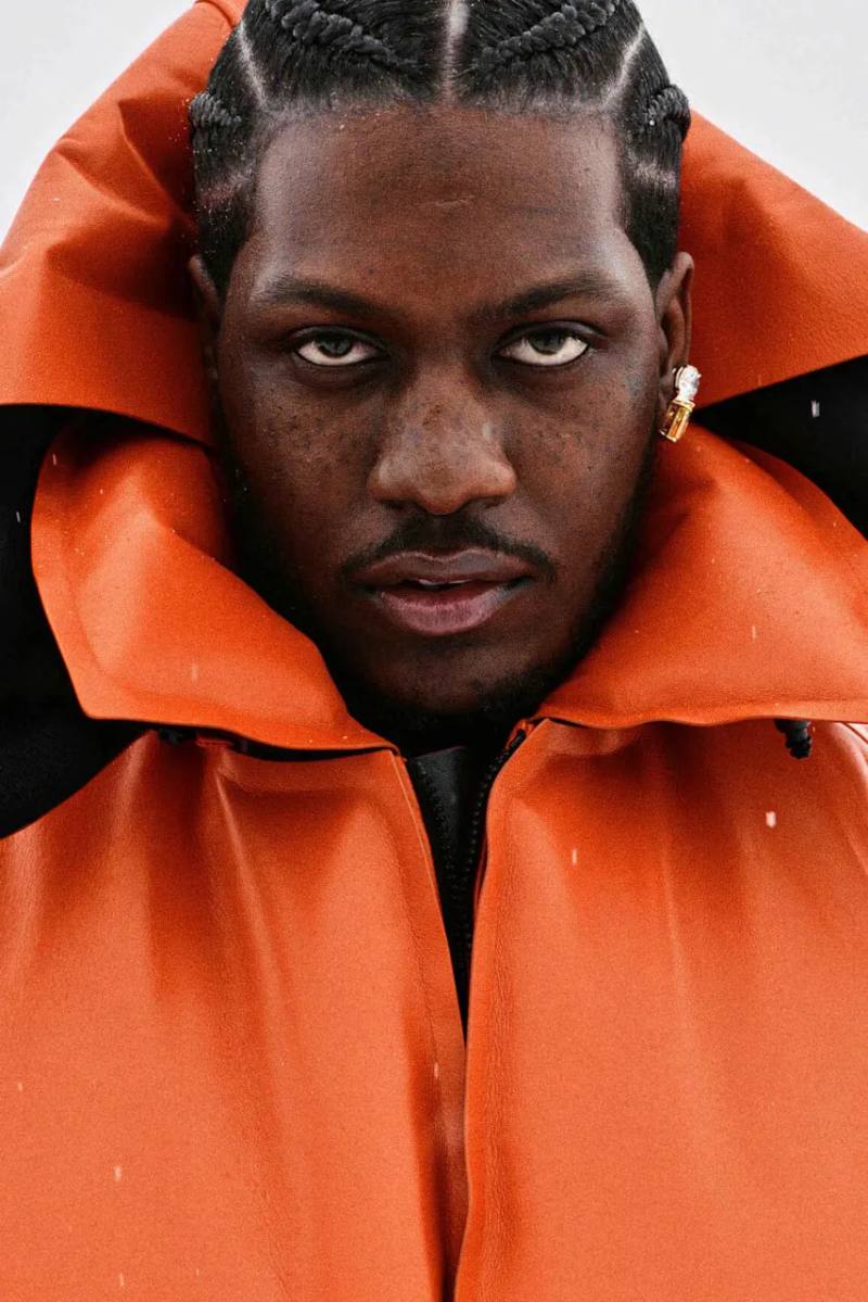 image detailing musician Lil Yachty and actress Julia Garner starring in a LOEWE fashion campaign filmed in the Alps.