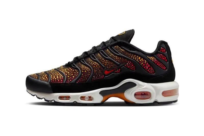 Nike Air Max Plus sneaker in sunset gradient, embellished with sparkling Swarovski crystals on TPU overlays, showcasing a luxurious blend of athletic design and high-fashion craftsmanship.