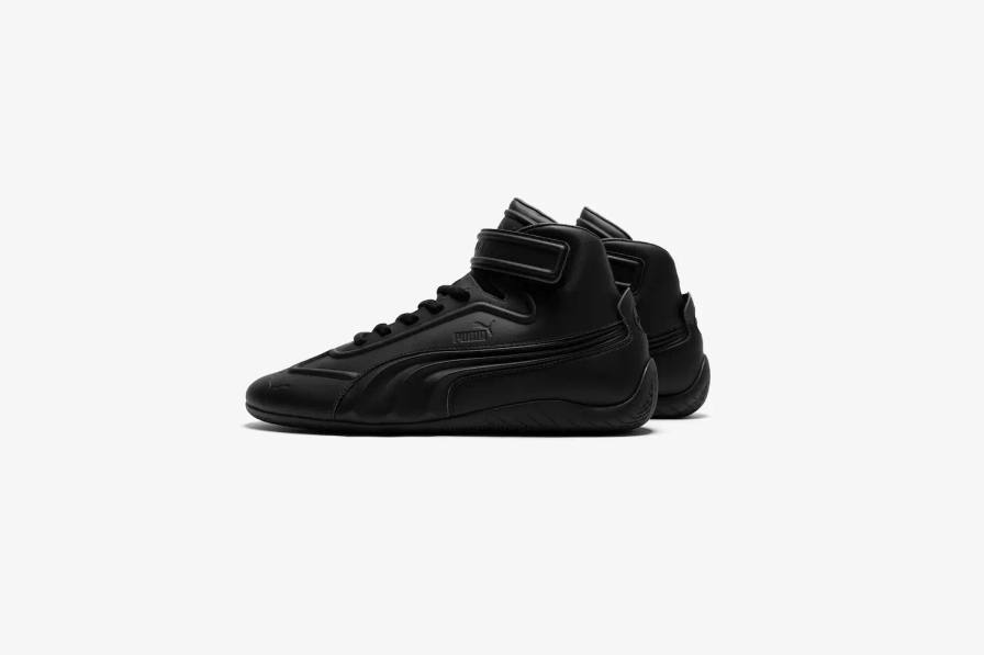 PUMA x Juun.J Speedcat sneakers in high and low-top versions, featuring shadow colorways, curved Formstrip details, and tire-inspired soles against a neutral background.