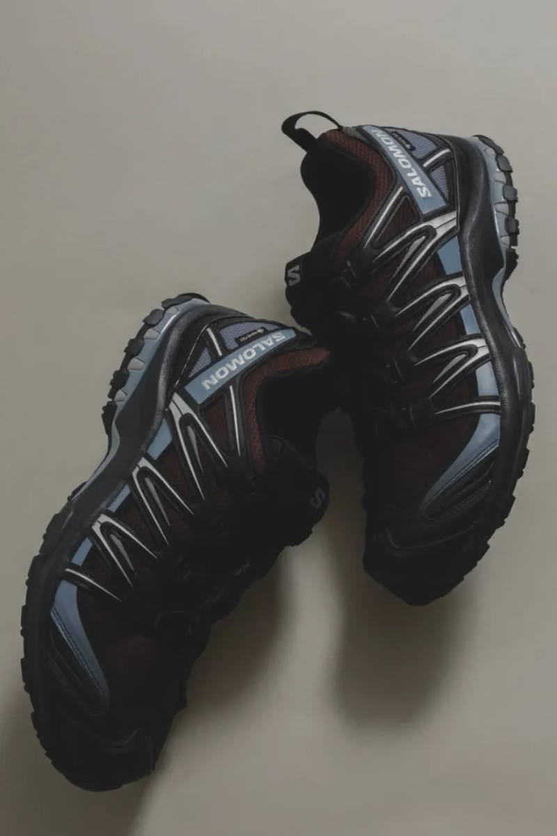 image of the URBAN RESEARCH and Salomon XA PRO 3D GTX collaboration featuring a brown color scheme, GORE-TEX lining, and trail construction.