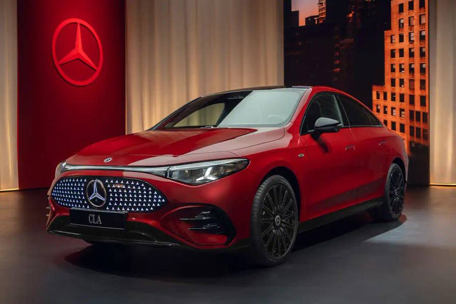 The new Mercedes-Benz CLA sedan featuring a sleek design with illuminated grille, panoramic roof, and minimalist interior with MBUX Superscreen.