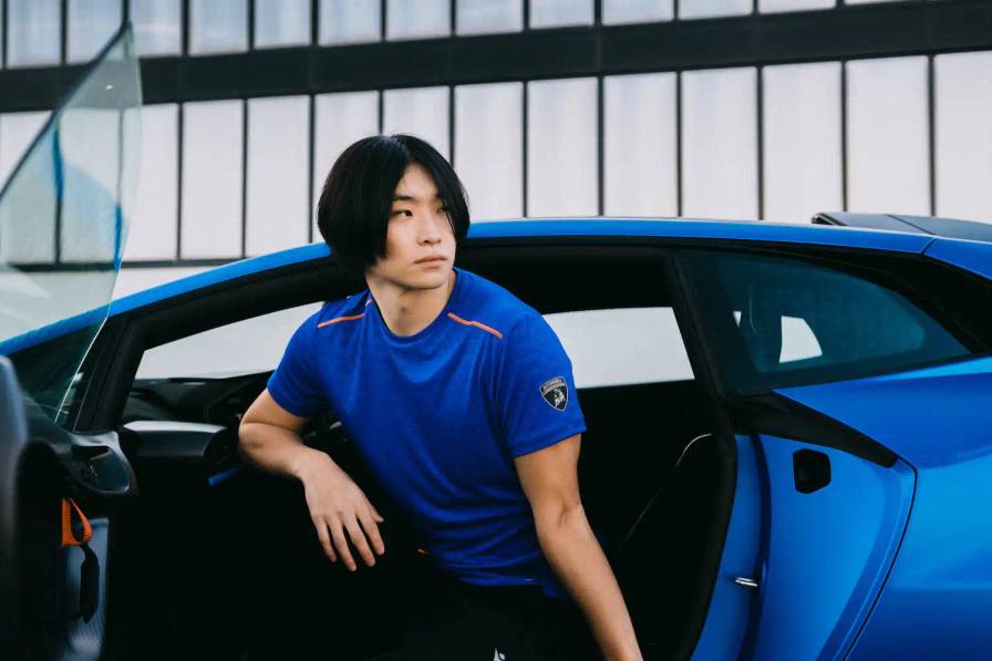 Lamborghini x Macron activewear collection featuring sports clothing in orange, blue, green, and purple, showcasing technical athletic wear inspired by luxury automotive design