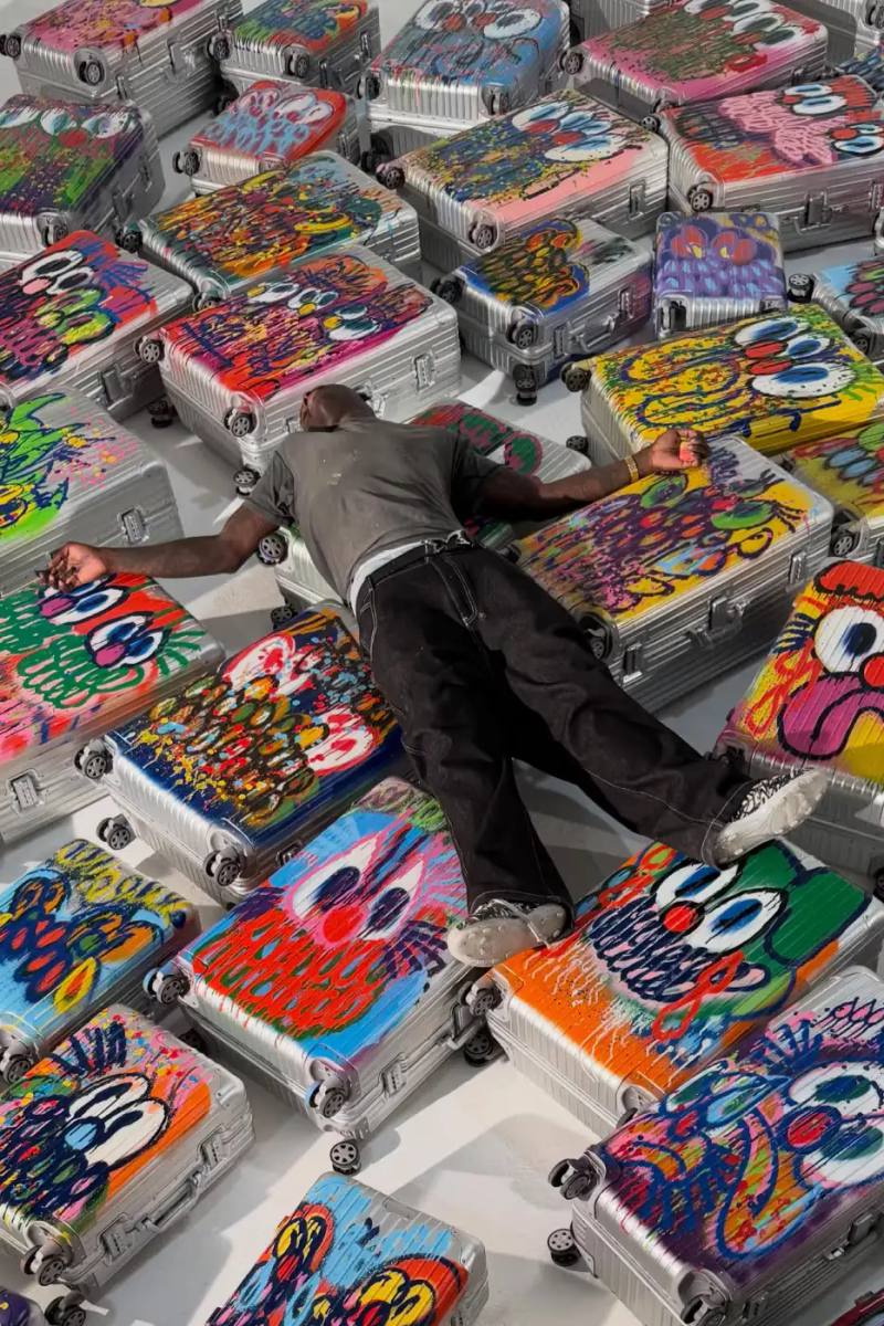 Image of an article about artist Olaolu Slawn teasing a graffiti-styled luggage collaboration with RIMOWA.