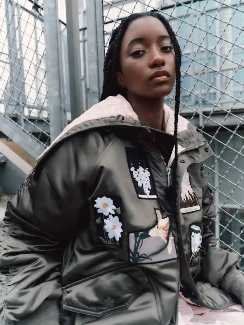 ALPHA INDUSTRIES AND CECILIE BAHNSEN COLLAB Alpha Industries and Cecilie Bahnsen release three bomber jacket styles featuring floral laser cuts and embroidery, combining military outerwear with feminine design elements.