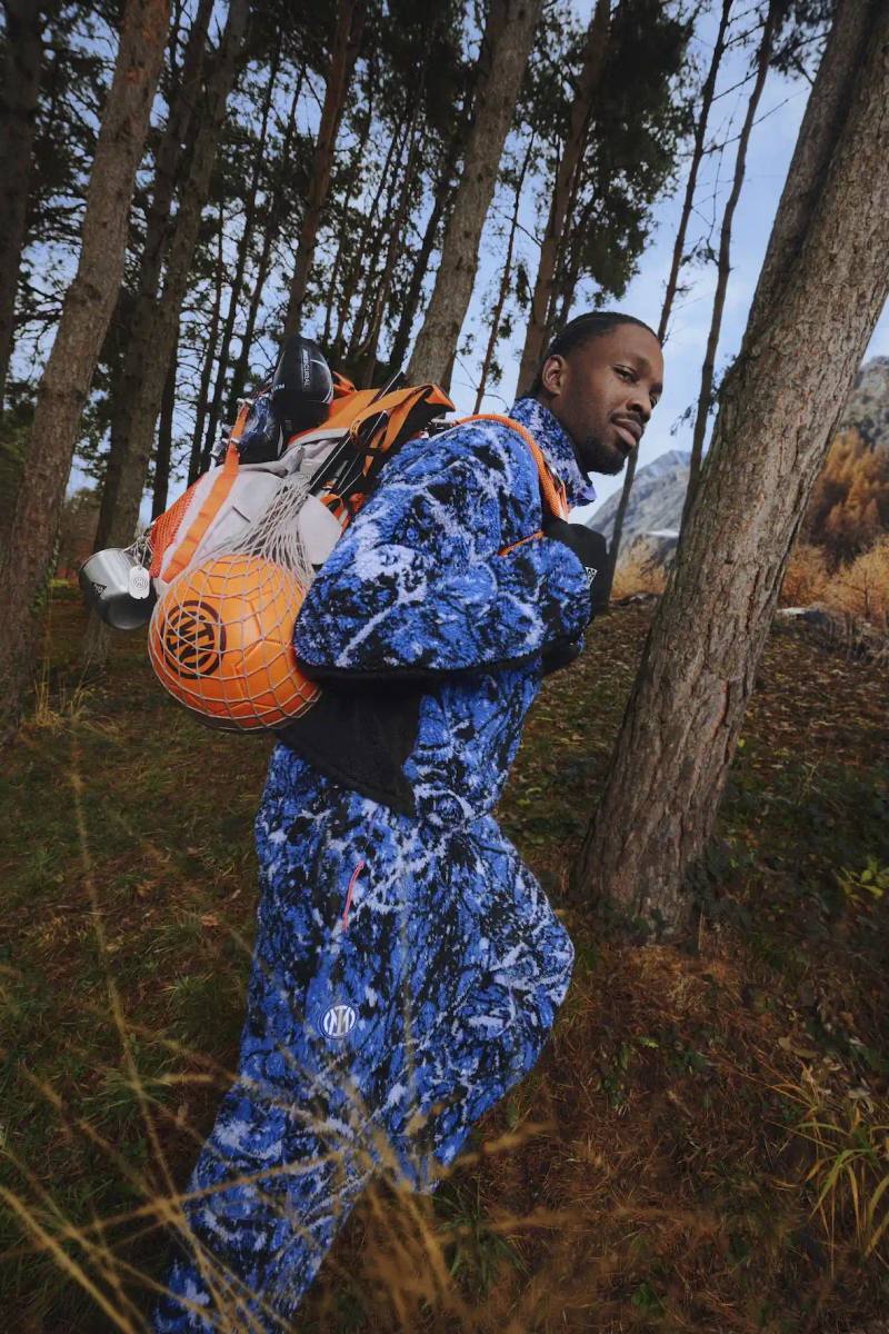 FC Internazionale Milano and Nike ACG launch their first collaboration featuring a fourth kit with snakeskin texture and mountain-inspired design elements, plus a full apparel collection for football and outdoor activities.