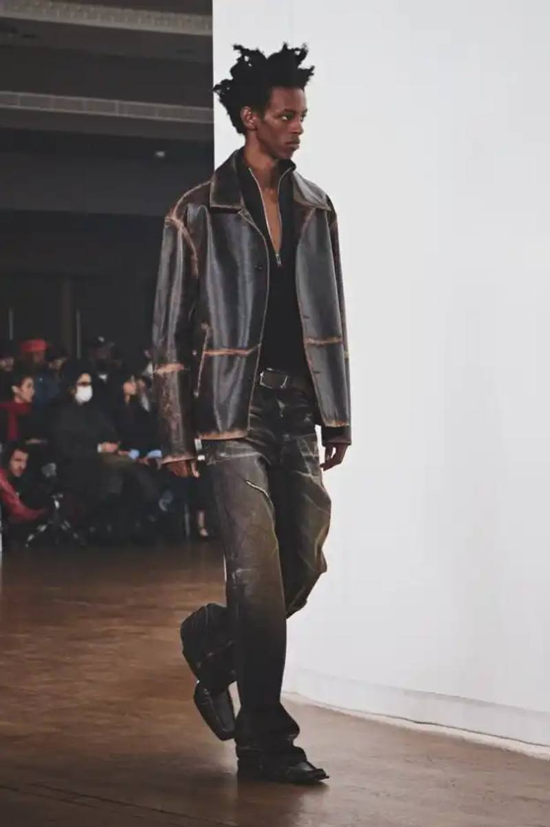 CAMPERLAB Fall/Winter 2026 collection presentation at Maison de la Mutualité in Paris features Arctic-inspired designs with destroyed finishes, cold-toned color palette, and collaborative RCD Mallorca capsule.
