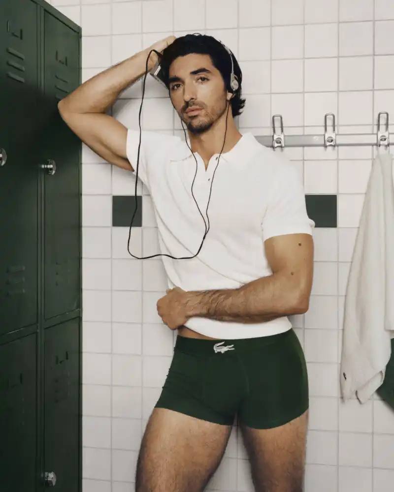 LACOSTE UNDERWEAR CAMPAIGN STARS TAYLOR ZAKHAR PEREZ ctor Taylor Zakhar Perez appears in Lacoste's new underwear campaign, photographed by Angelo Pennetta in a Parisian gym locker room setting.