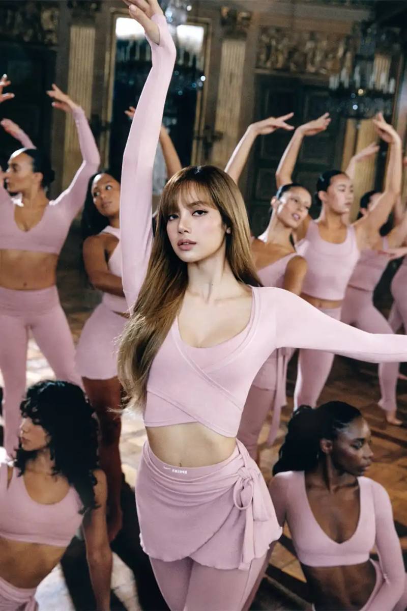 Nike and SKIMS announce their Spring 2026 collection with ballet-inspired athletic wear, introducing the NikeSKIMS Rift Satin shoe and five material collections. LISA of BLACKPINK appears in the campaign shot in Paris.