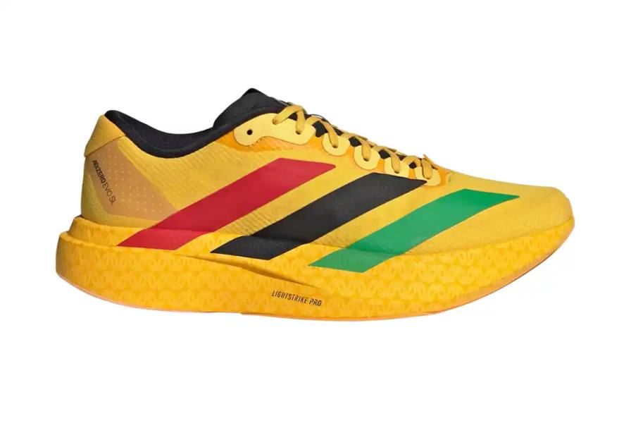 TITLE: BOB MARLEY ADIDAS ADIZERO EVO SL DROPS FEBRUARY 6 Product image shows yellow mesh running shoe with red, black, and green Three Stripes branding, featuring Bob Marley portrait on tongue.