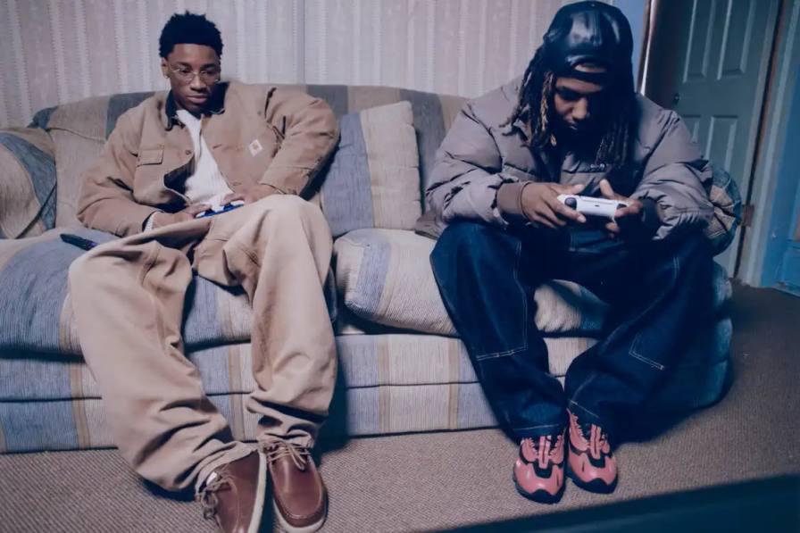 CARHARTT WIP FW25 CAMPAIGN SHOWS SUBURBAN LIFE image of Carhartt WIP Fall Winter 2025 campaign showing teenagers and dancer in Atlanta suburban neighborhood wearing OG Chore Coat and fleeces