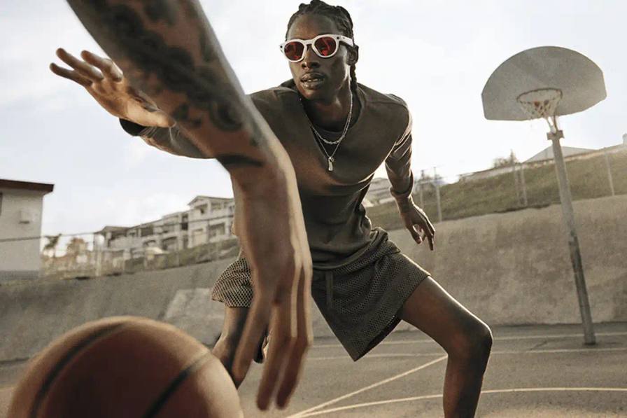 META AND OAKLEY LAUNCH PERFORMANCE AI GLASSES image announces a collaboration between Meta and Oakley to create the HSTN performance glasses. The eyewear combines artificial intelligence features with sports-focused design, including voice control, high-resolution recording capabilities, and extended battery life. The glasses target athletes and active users, offering hands-free operation and water resistance. Six models will be available with various lens options, priced from £399 to £499, with the limited edition available for pre-order from July 11.