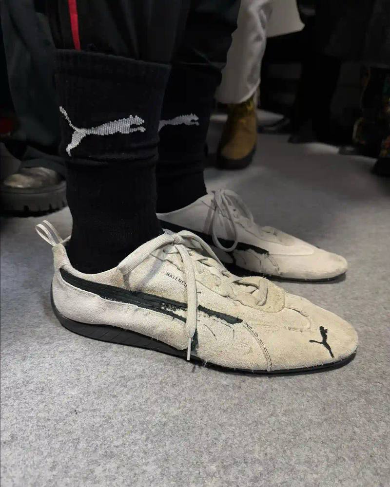 Balenciaga's Winter 2025 runway show featuring the new PUMA collaboration, showcasing redesigned Speedcat shoes and oversized sportswear pieces that blend high fashion with athletic heritage