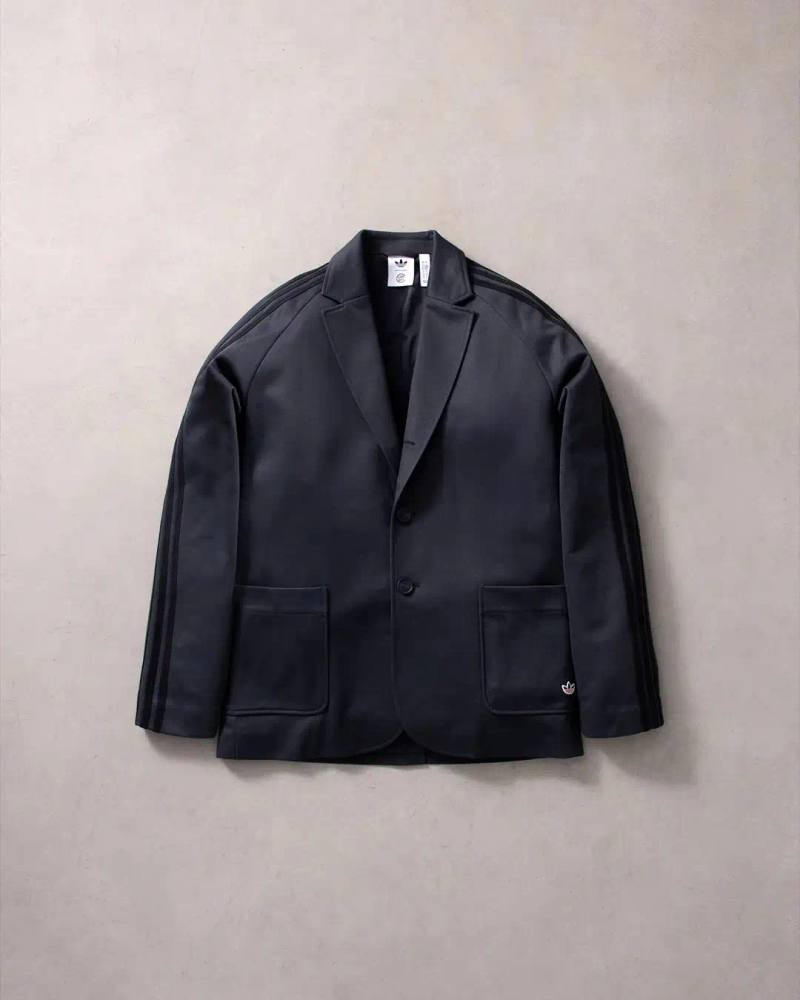 Colt/Adidas Black tailored suit and modified Superstar sneakers from CLOT x adidas Originals collaboration displayed against neutral background
