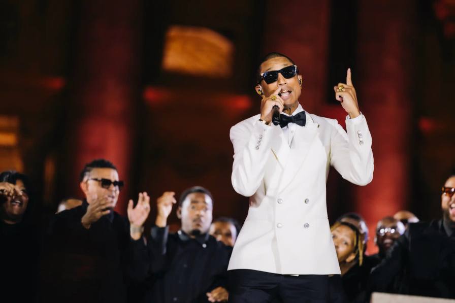 RAP COMES TO VATICAN WITH CLIPSE, PHARRELL & JOHN LEGEND CONCERT image of First-ever rap performance at Vatican City as Clipse, Pharrell Williams, and John Legend take the stage in St. Peter's Square for Grace for the World concert, marking a unique blend of hip-hop culture and religious tradition.
