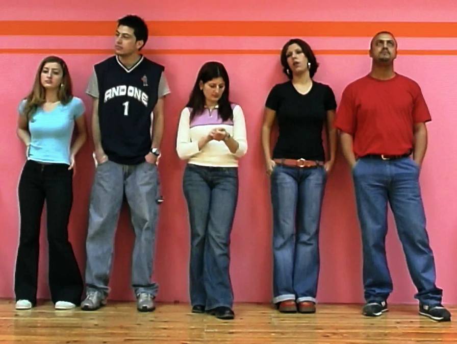 An analysis of Phil Collins' 2004 video work showing Palestinian performers dancing continuously for eight hours in Ramallah during the Second Intifada, examining the work's political significance and its contrast with contemporary social media violence.