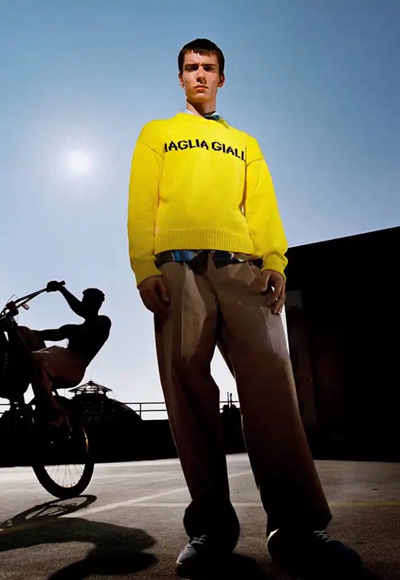 image about fashion designer Massimo Giorgetti's Spring/Summer 2026 collection for MSGM brand, inspired by cycling culture and featuring collaboration with Milan cyclists.