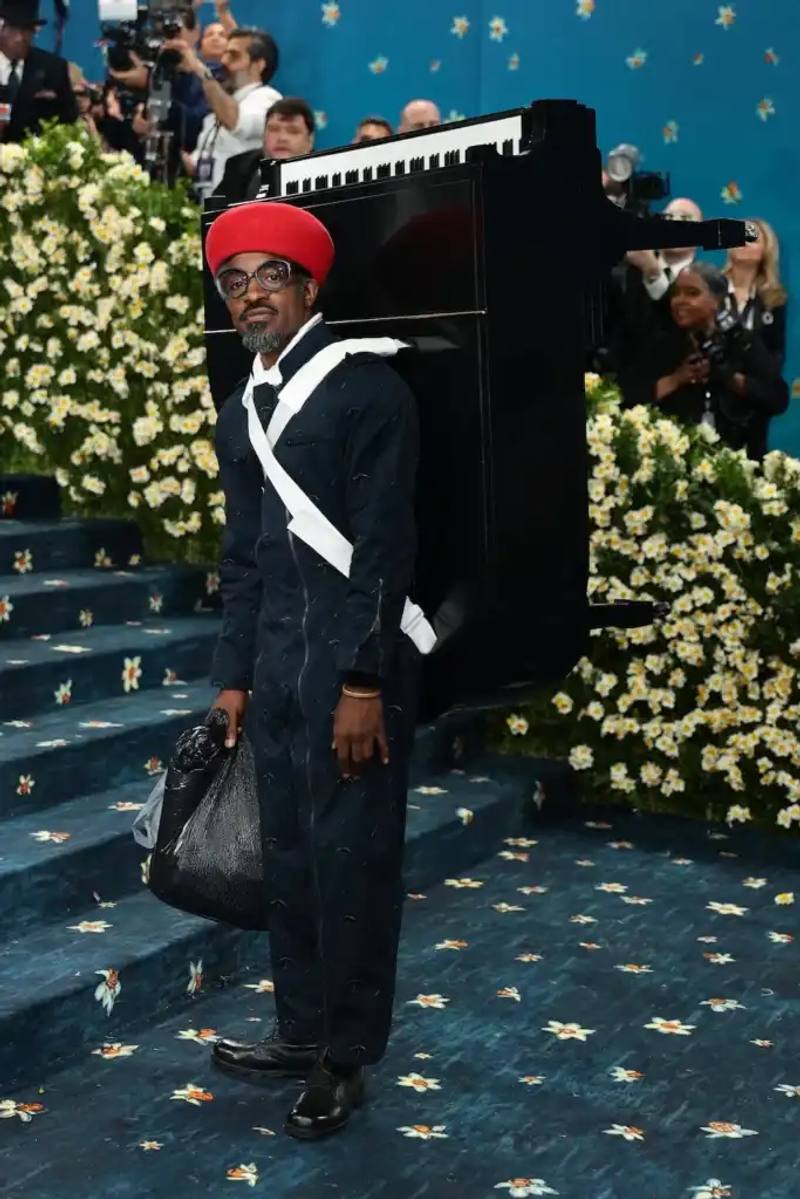 image of the 2025 Met Gala event celebrating the "Superfine: Tailoring Black Style" exhibition. It describes key celebrity appearances including André 3000's piano-shouldered look, pregnant Rihanna, and Teyana Taylor's Ruth E. Carter design. The article mentions prominent attendees like A$AP Rocky, Lewis Hamilton, and Zendaya, and highlights Moncler's first-time participation with custom designs for celebrities including Serena Williams and Alicia Keys. The text explains how the event's "Tailored for You" theme connected to Black dandyism and cultural identity expressed through fashion.