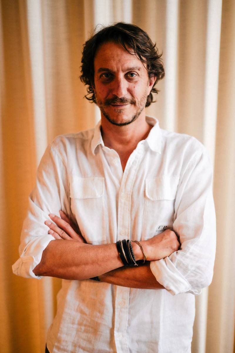 image of an interview with Lorenzo Osti about fashion history and design philosophy during Paris Fashion Week. Shoot by Lorenzo Bonanni for Casawi Magazine