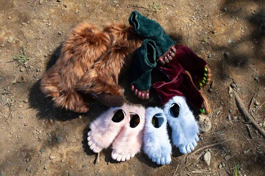 Close-up of painted toes on the green Suicoke x Midorikawa faux fur FiveFingers shoe, showing contrast between fur texture and smooth toe caps
