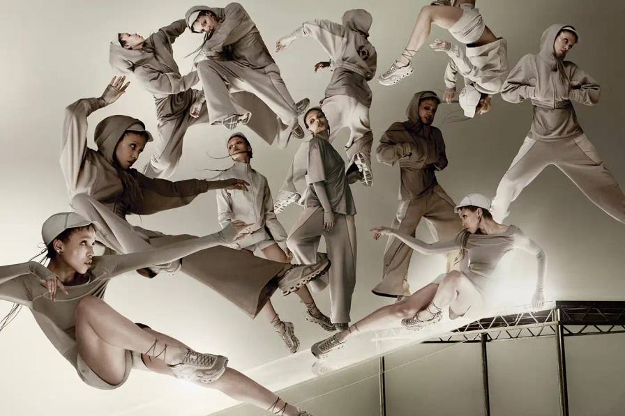 image announces the launch of a new athletic wear collaboration between musician FKA twigs and sportswear brand On. The collection includes a dance-inspired sneaker called Cloud x FKA and various athletic apparel pieces in neutral colors. The article explains the design philosophy behind the collaboration, focusing on versatility for people with active, varied lifestyles. It includes quotes from FKA twigs about creating clothing that adapts to different daily activities, from training to meetings to studio work. The collection will be available for purchase starting June 26 through On's website.