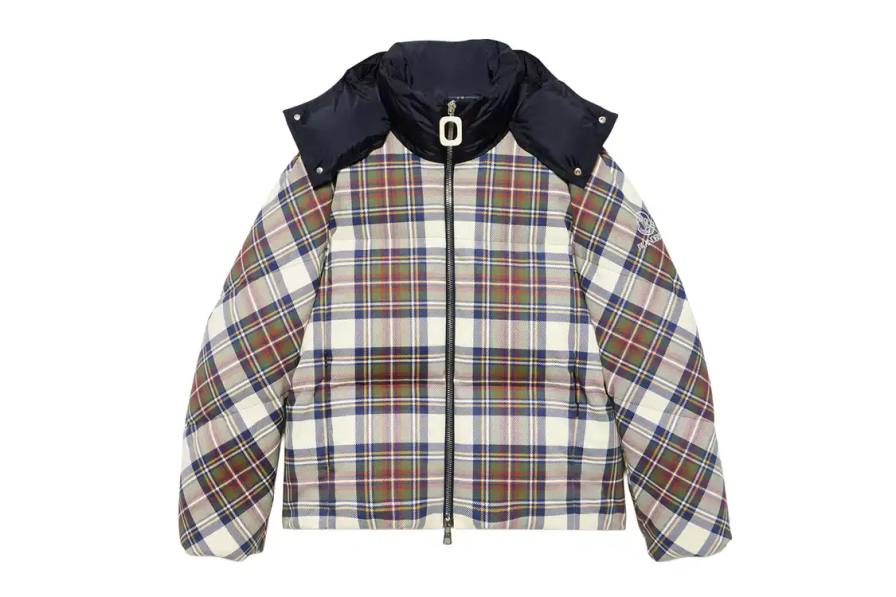 Moncler collaborates with JW Anderson on a limited collection featuring two down-filled puffer jackets with archive-inspired designs, priced at $2,890 USD each.