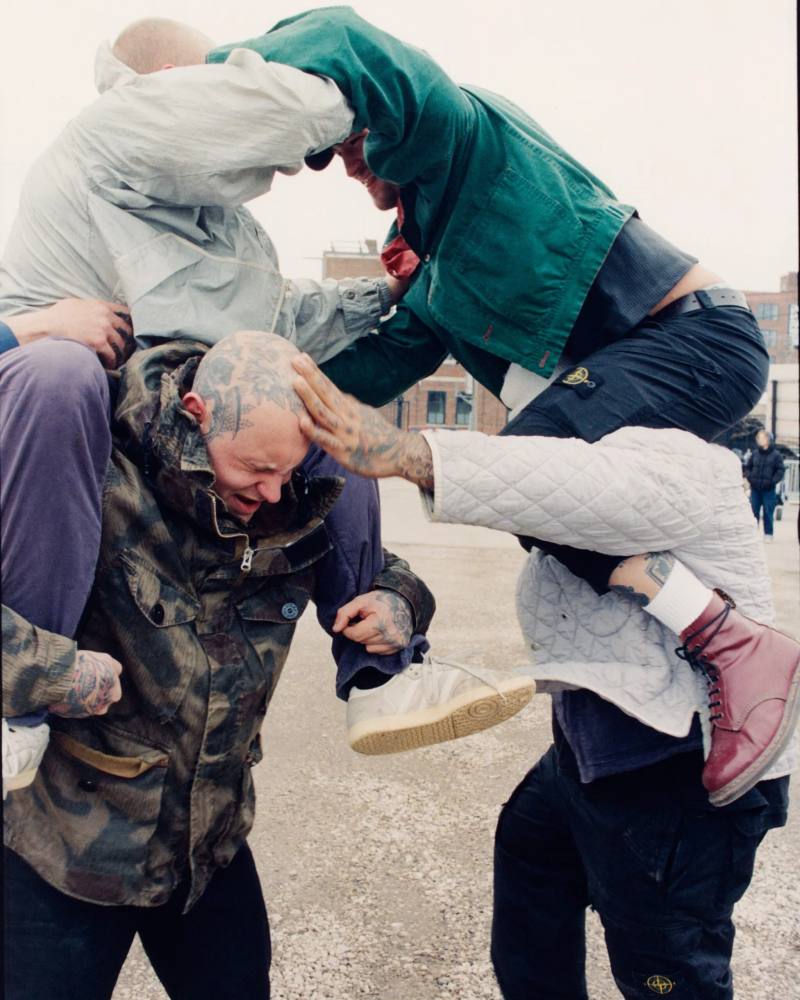 image of photograph collection detailing musicians wearing vintage and modern Stone Island outerwear on tour across North America and Europe.