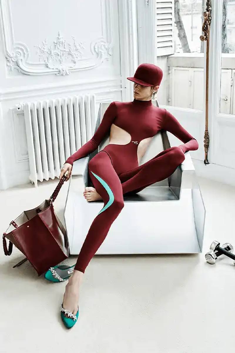 Balenciaga Fall 2026 collection features NBA collaboration with athletic wear, formal tailoring, and Manolo Blahnik footwear partnership under creative director Pierpaolo Piccioli.