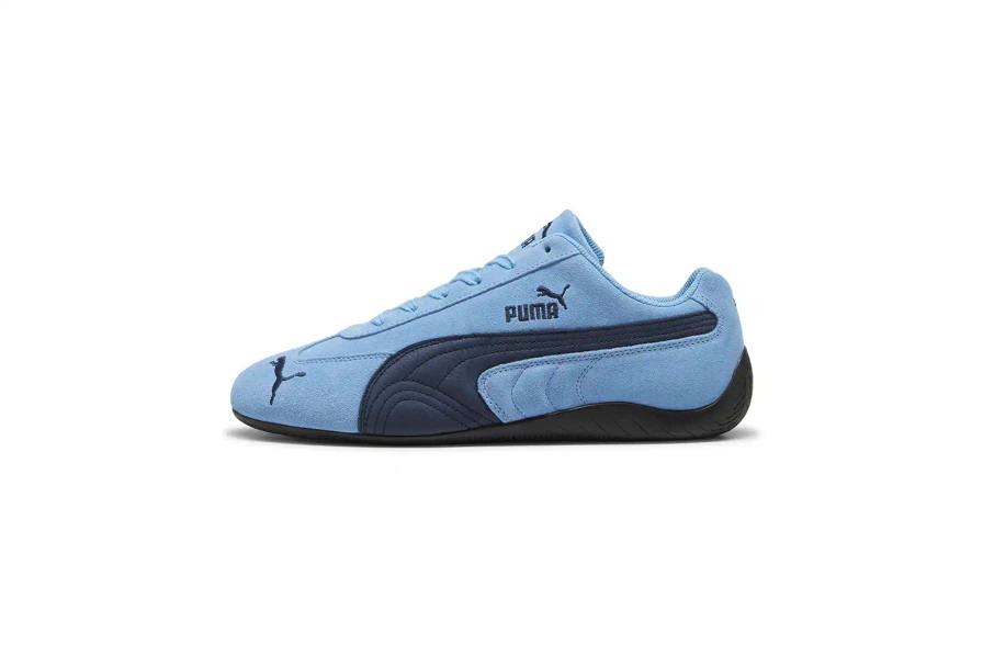 PUMA SPEEDCAT RETURNS WITH TWO NEW HERITAGE-INSPIRED COLORWAYS PUMA Speedcat sneaker in Light Blue with Navy accents, showing the classic low-top silhouette and signature Cat logo