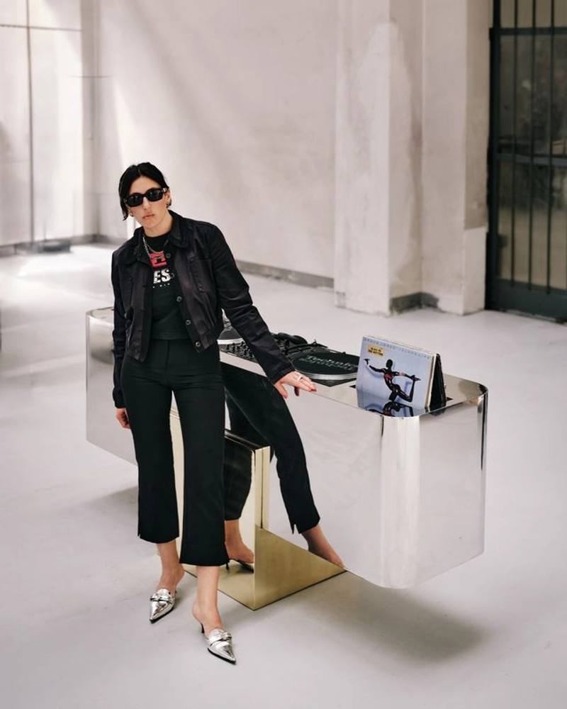 an image detailing an interview with designer Arielle of Slash Objects about her background, material choices, and new furniture collections.