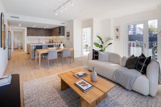 Contemporary kitchen with new countertops at Victor