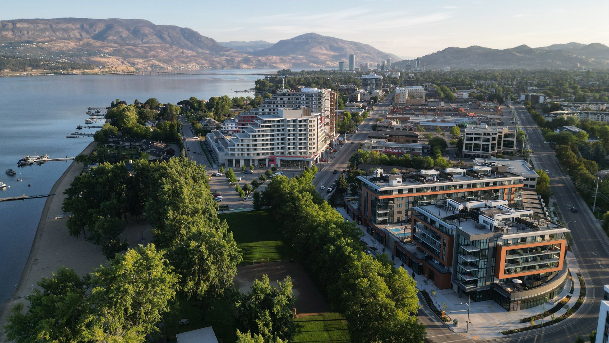 Caban by Cressey - a mid-rise condo building with an elegant waterfall and retail spaces below