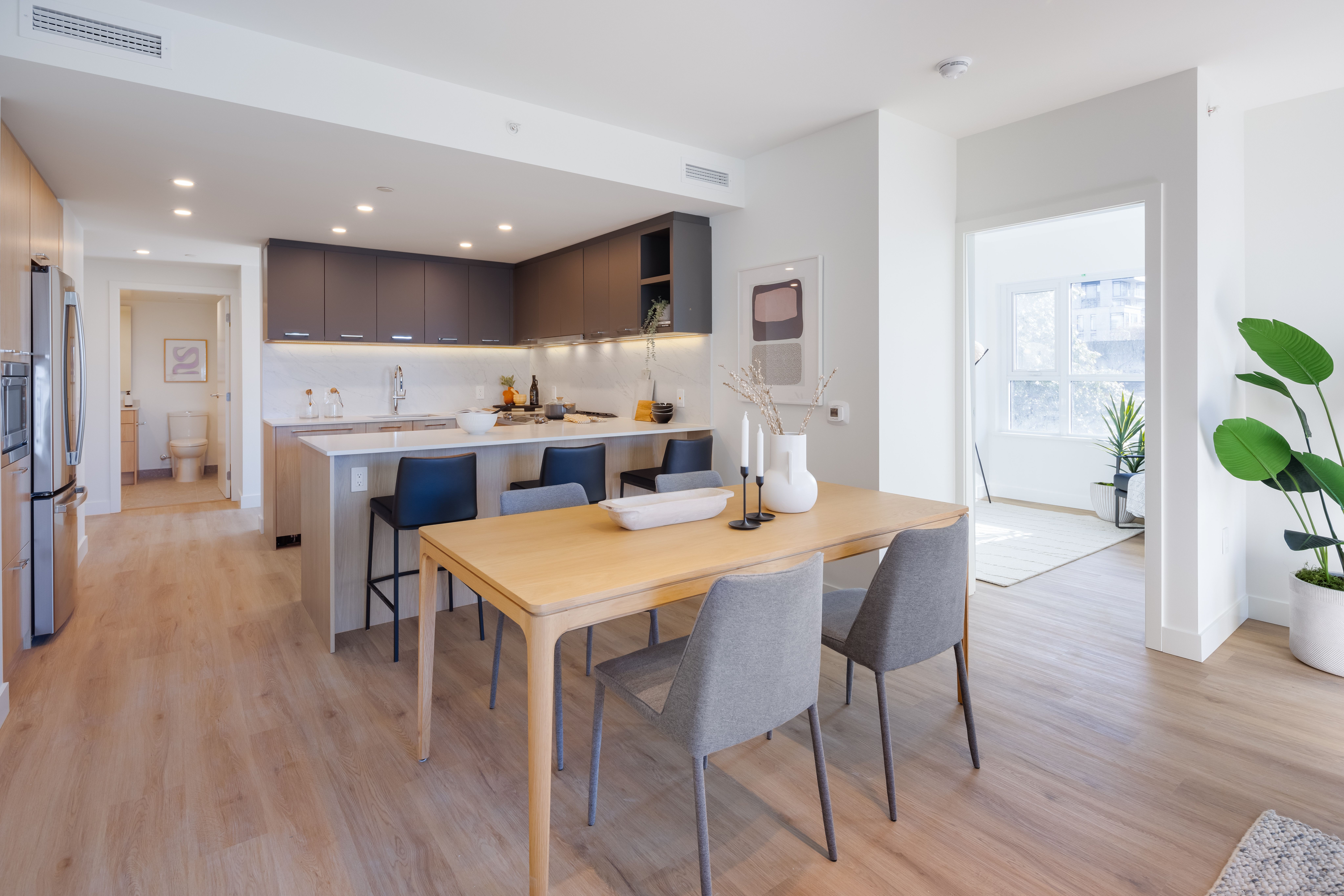 Modern kitchen with quartz countertops at Victor