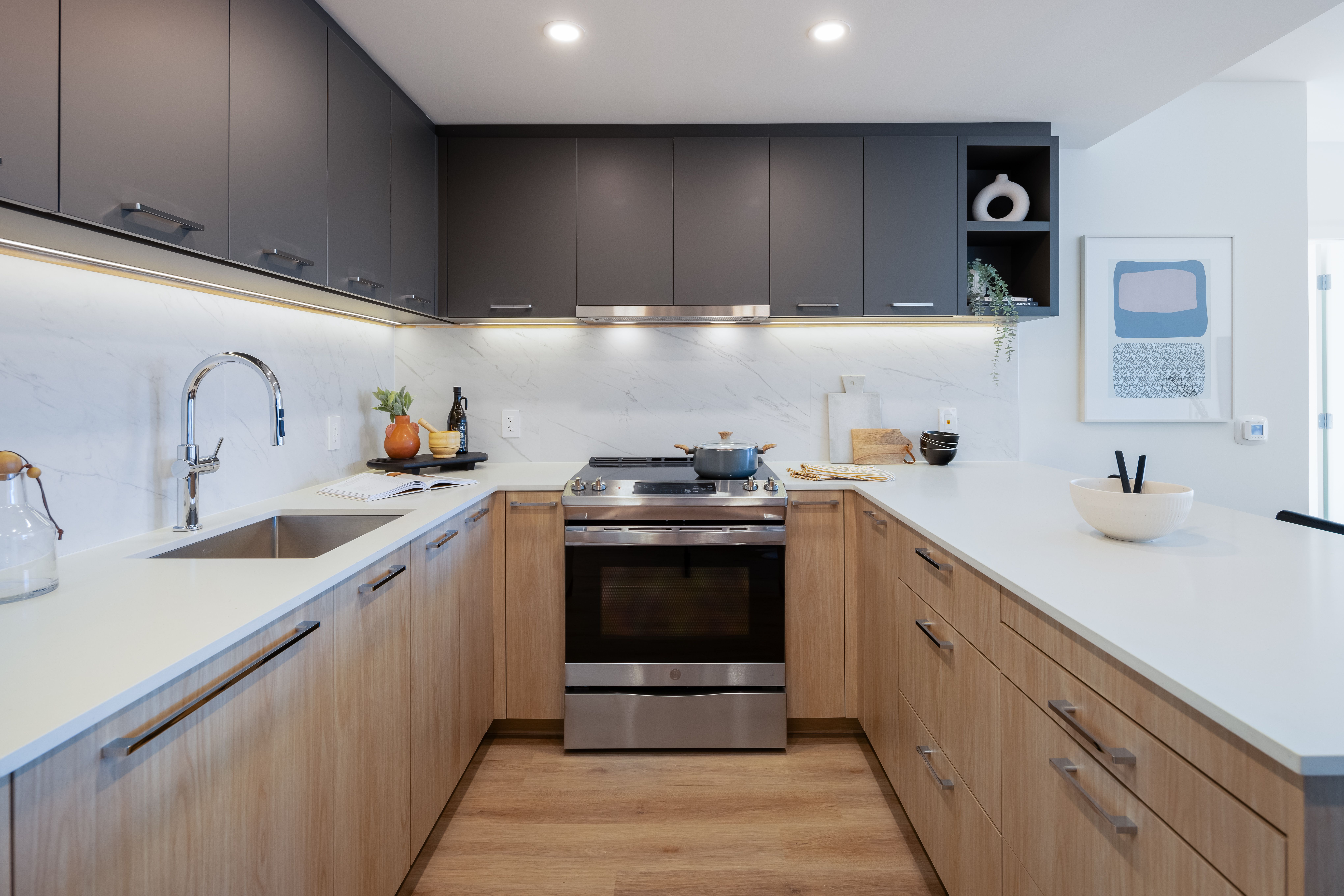 Close angle of kitchen with quartz countertops at Victor
