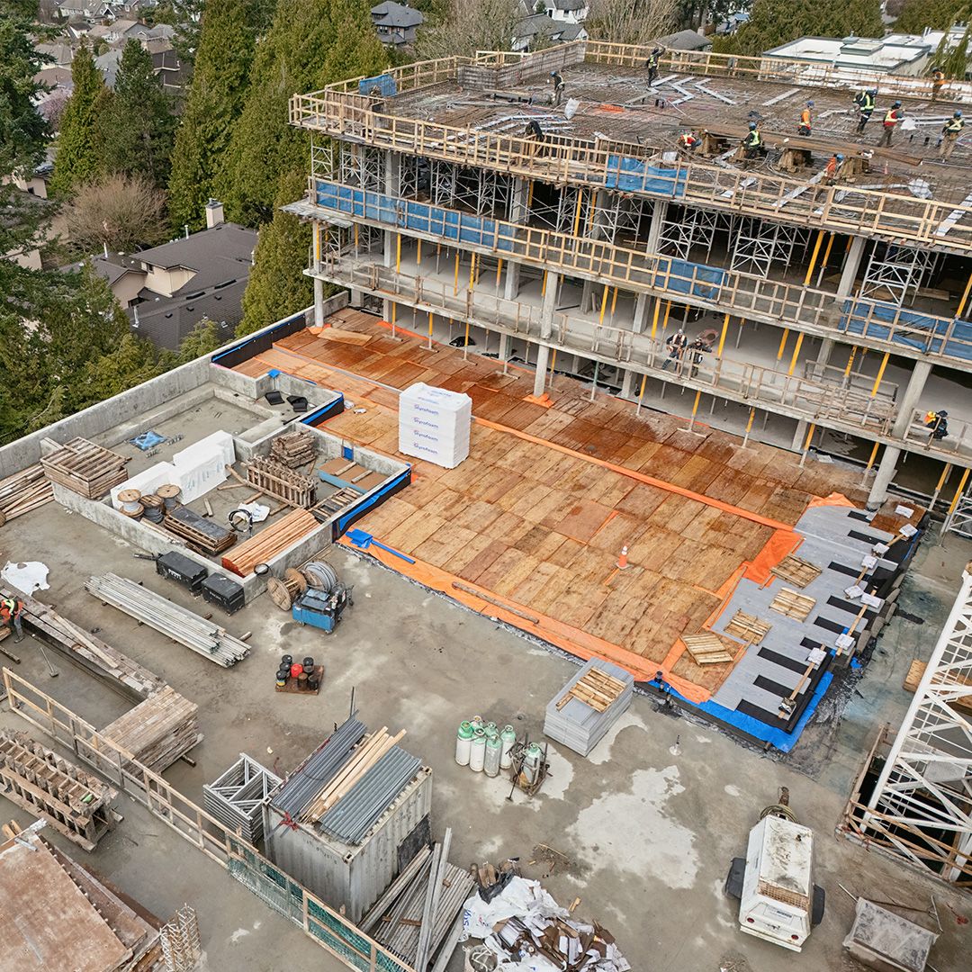 Close-up of courtyard amenity area - waterproofing installation for future greenspace and Spa footprint visible