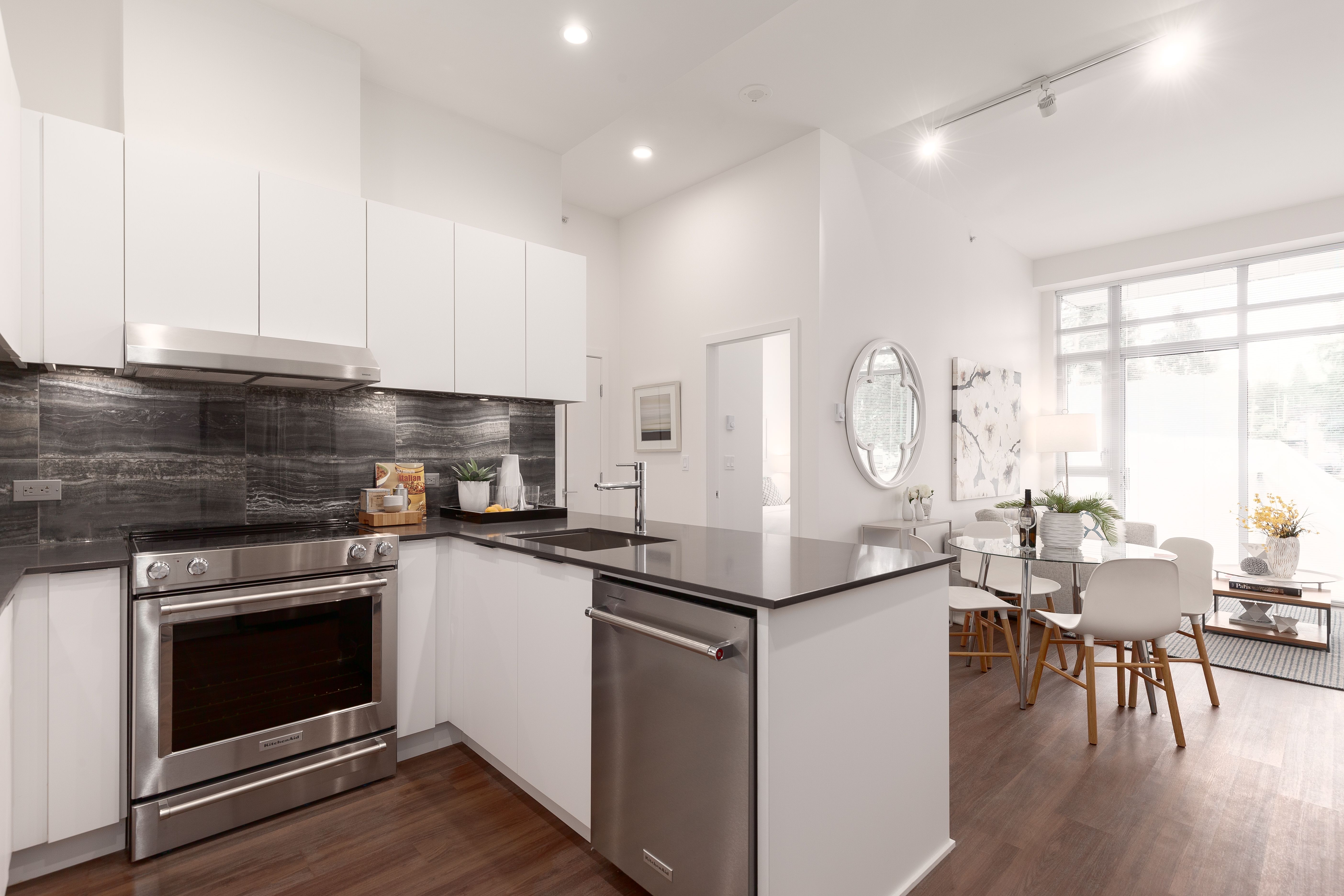 Near shot angle of kitchen area with modern finishes in Everlea apartment