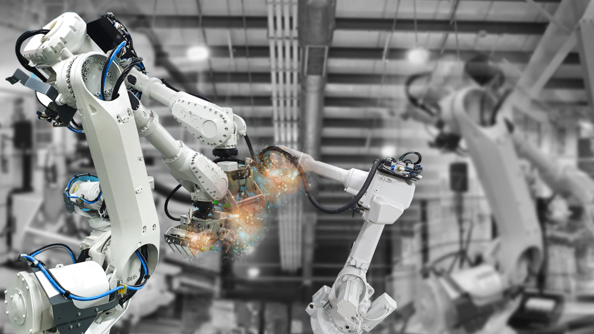 robot arm working on a system to improve workflow automation