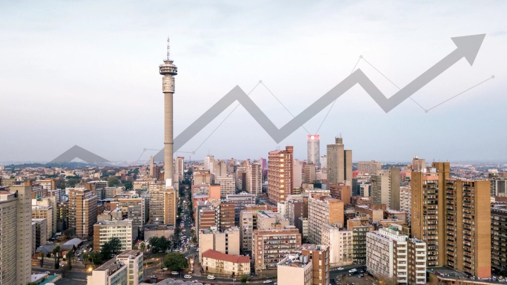 Johannesburg city skyline with a tall tower and high-rise buildings, overlaid with a rising arrow graph indicating growth or progress.
