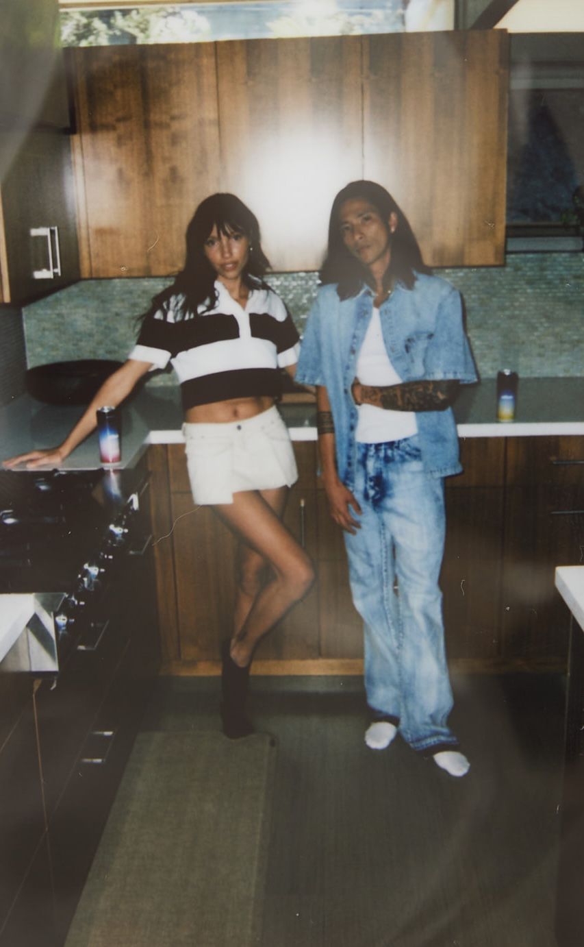 Polaroid Photo of two people drinking Altitude