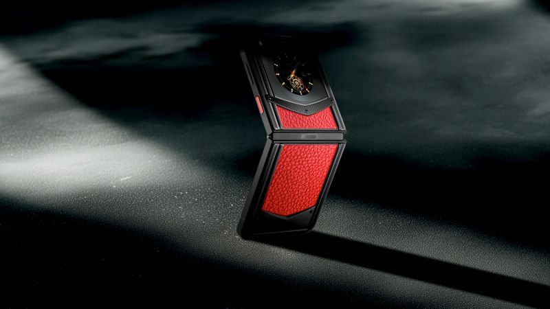 A detailed view of the hinge and textured finish on the VERTU Quantum Flip phone.