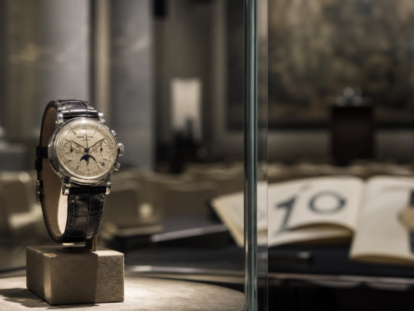 Rare mechanical watch displayed in an international auction preview room