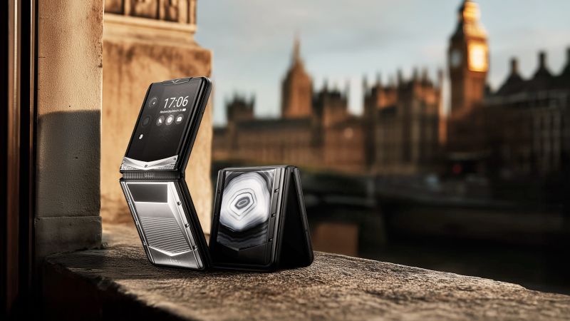 A luxury smartphone with a bespoke alligator skin finish held in hand