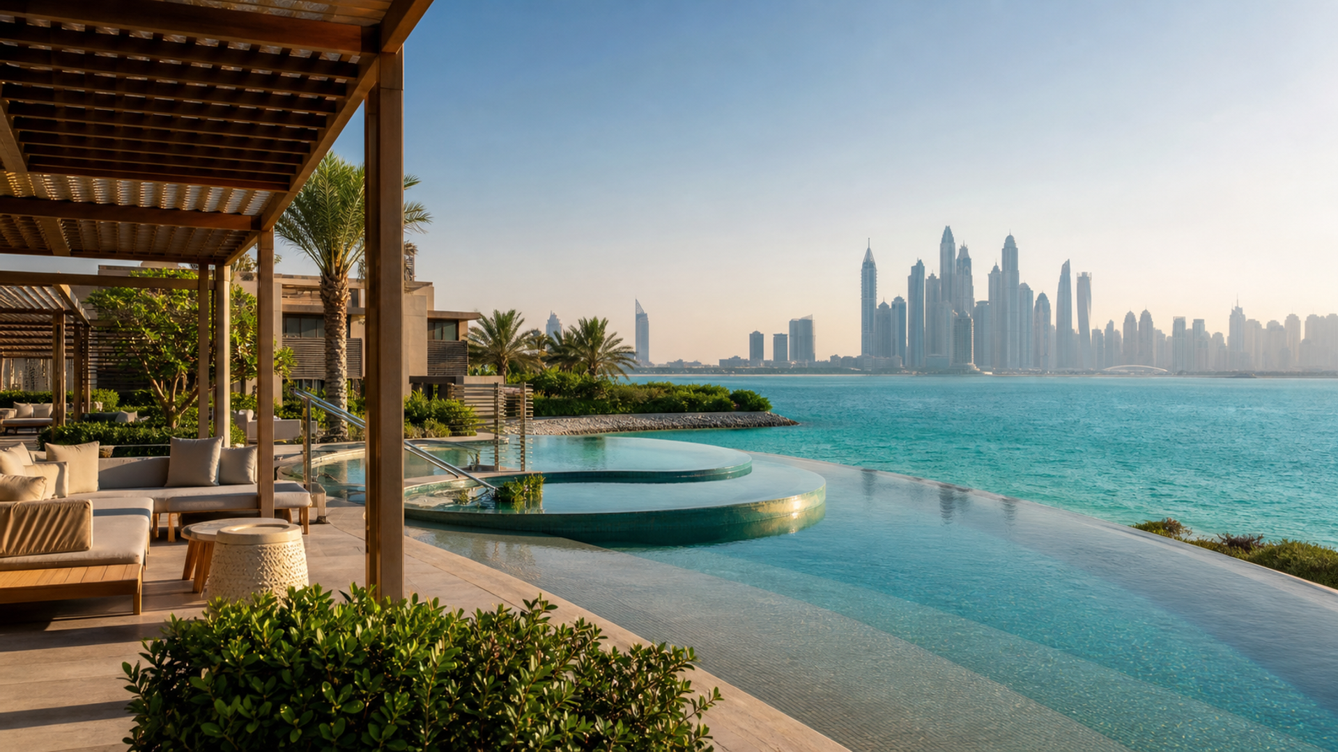 Contemporary Dubai resort terrace overlooking the Gulf and skyline