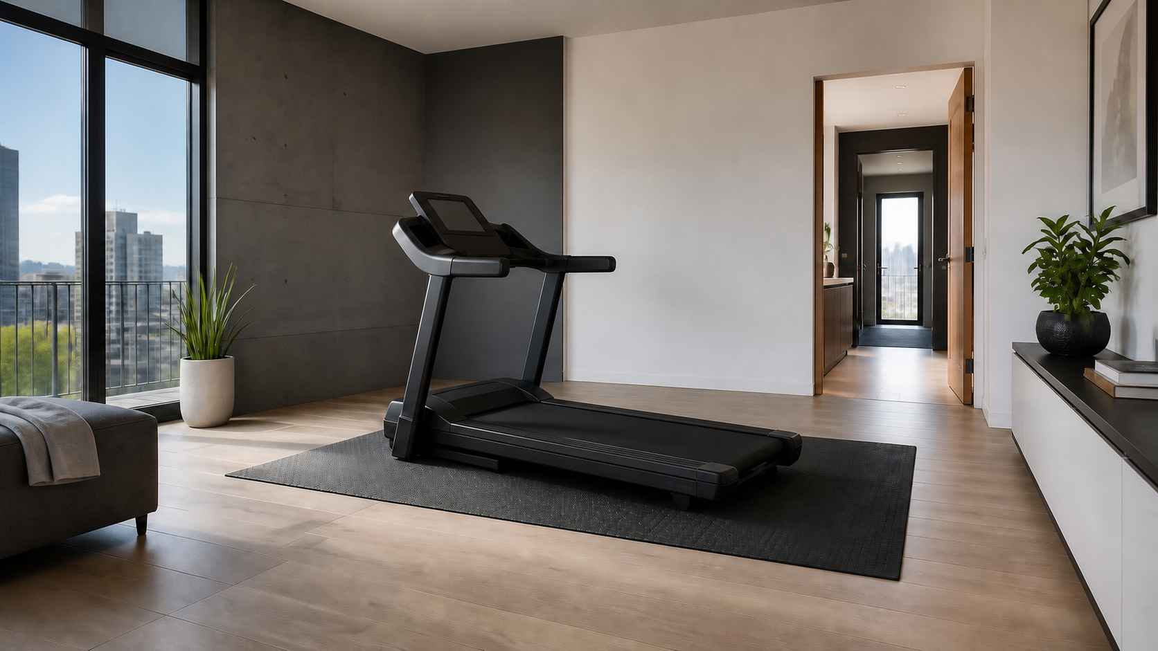 Home treadmill positioned with safe clearance in a bright apartment room