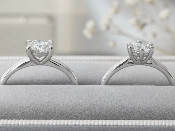 Four-prong and six-prong solitaire engagement-ring profiles on jeweller trays