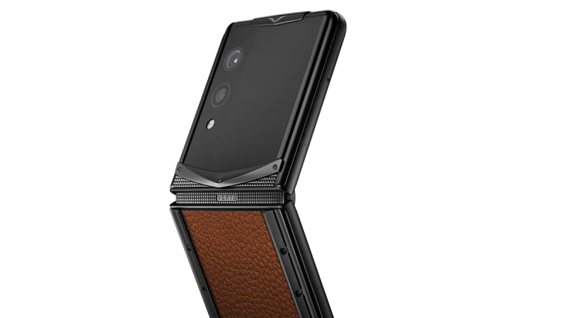 A VERTU Quantum Flip in a dark finish, showcasing its sleek, closed profile.